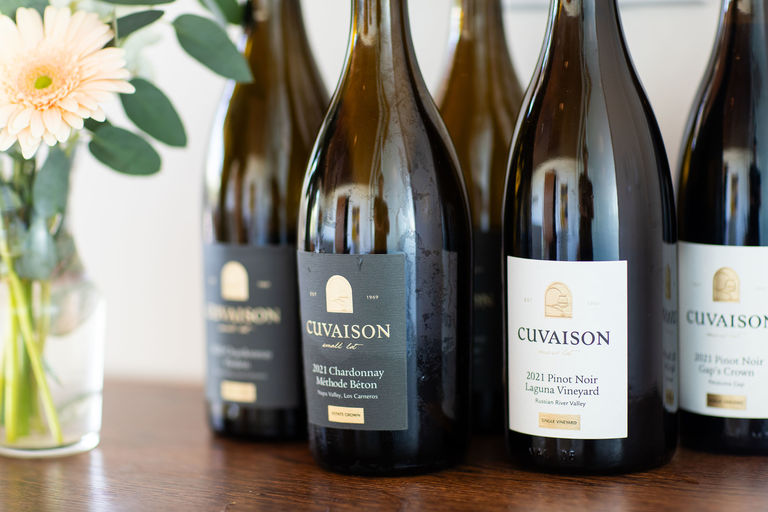 Bottles of wine on a wood table